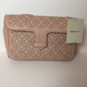 New blush pink purse rivet designs each side.